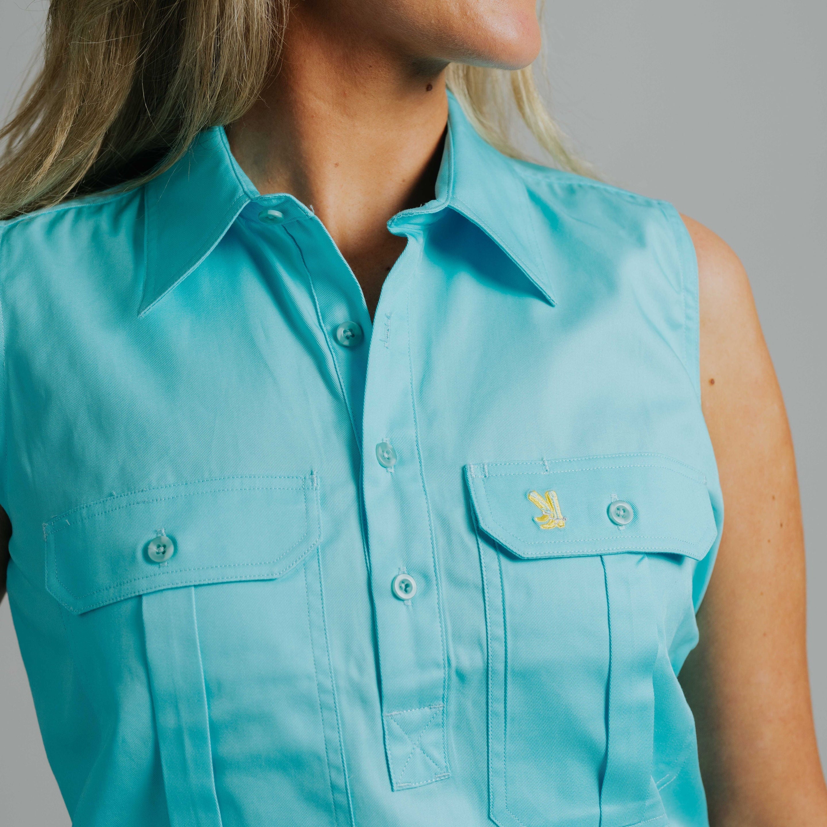 Sleeveless Turquoise Work Shirt